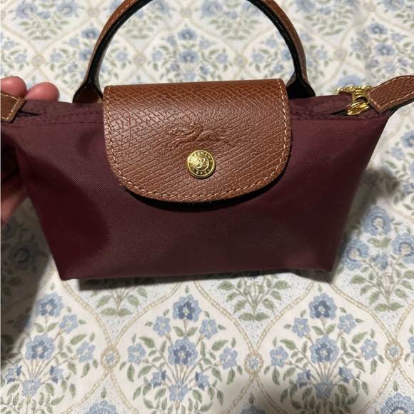 Longchamp Handbags - Longchamp Small Burgundy Nylon Pouch with Brown Leather Trim